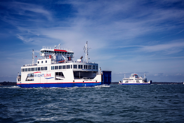 Two Wight Class ferries pass each other in the Solent