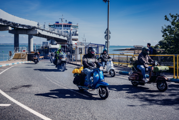 Motorcycle scooters leaving Fishbourne