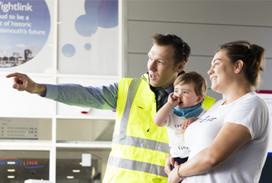 Member of Wightlink staff helping customer