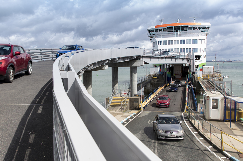 Cars unload Victoria of Wight ferry at Fishbourne port